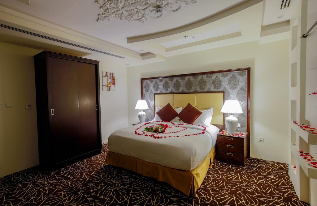 Rest Night Serviced Apartments- Alhamra Riade Exterior foto A bedroom at the hotel