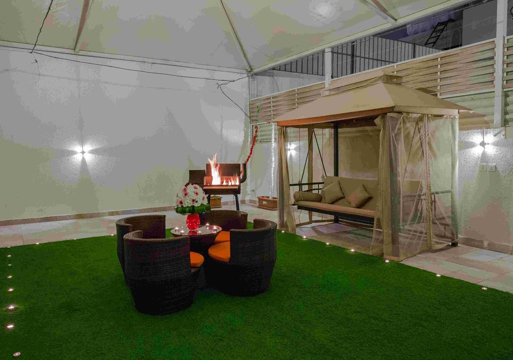 Rest Night Serviced Apartments- Alhamra Riade Exterior foto The interior of the tent